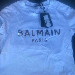 Brand new men’s balmain shirt size Large original price is $495 plus taxes!